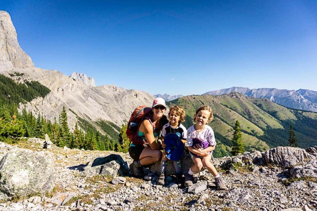 Celine Brewer and kids at the top of West Wind Pass trail in Kananaskis