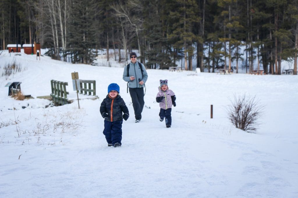 Dan Brewer and two children on Johnson Lake winter hike.