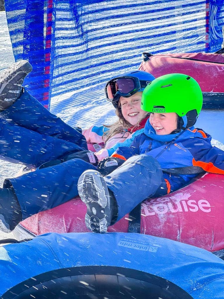 kids snow tubing at Lake Louise ski resort.