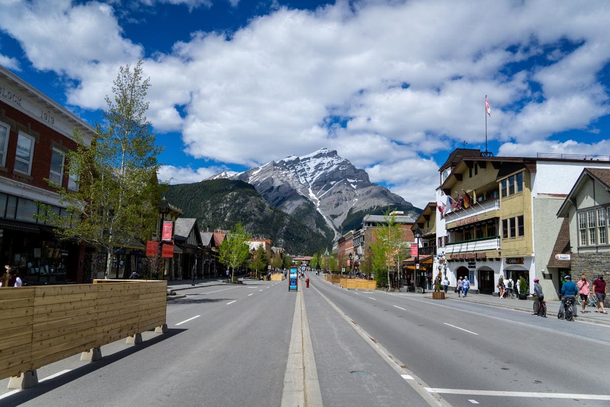 Banff avenue in the town of Banff with Cascade mountain in the background.