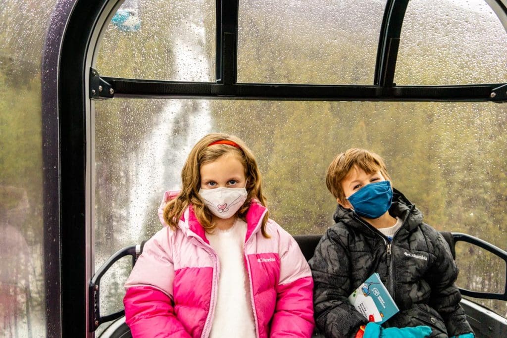 two kids on Banff Gondola.