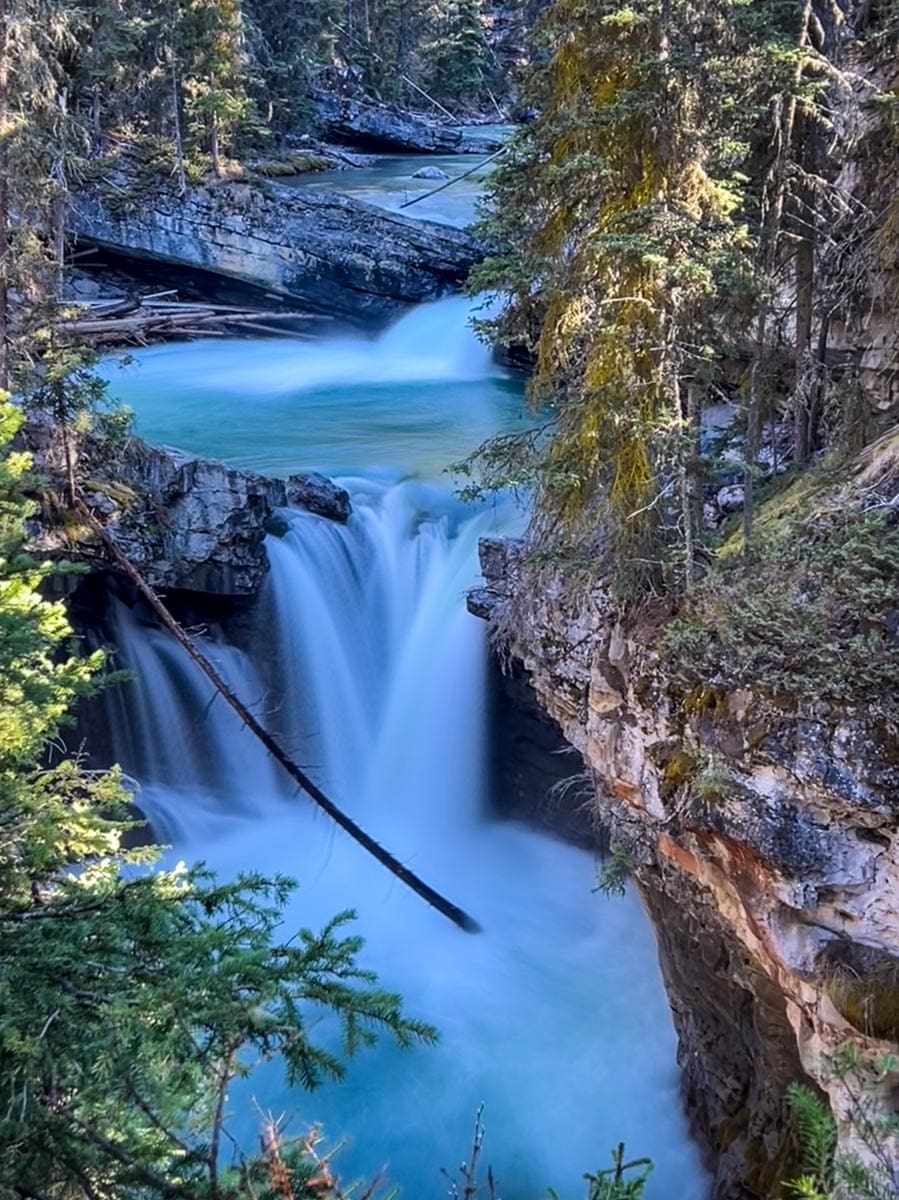 One of the many waterfalls along the Johnston Canyon Hike in Banff National Park.
