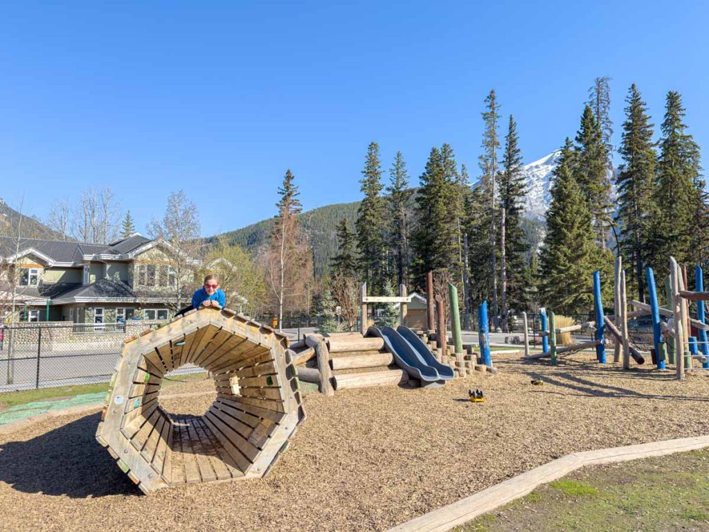 a 12-year old girl from the Banffwithkids.com blog, enjoys playing at the Banff Elementary School Playground.