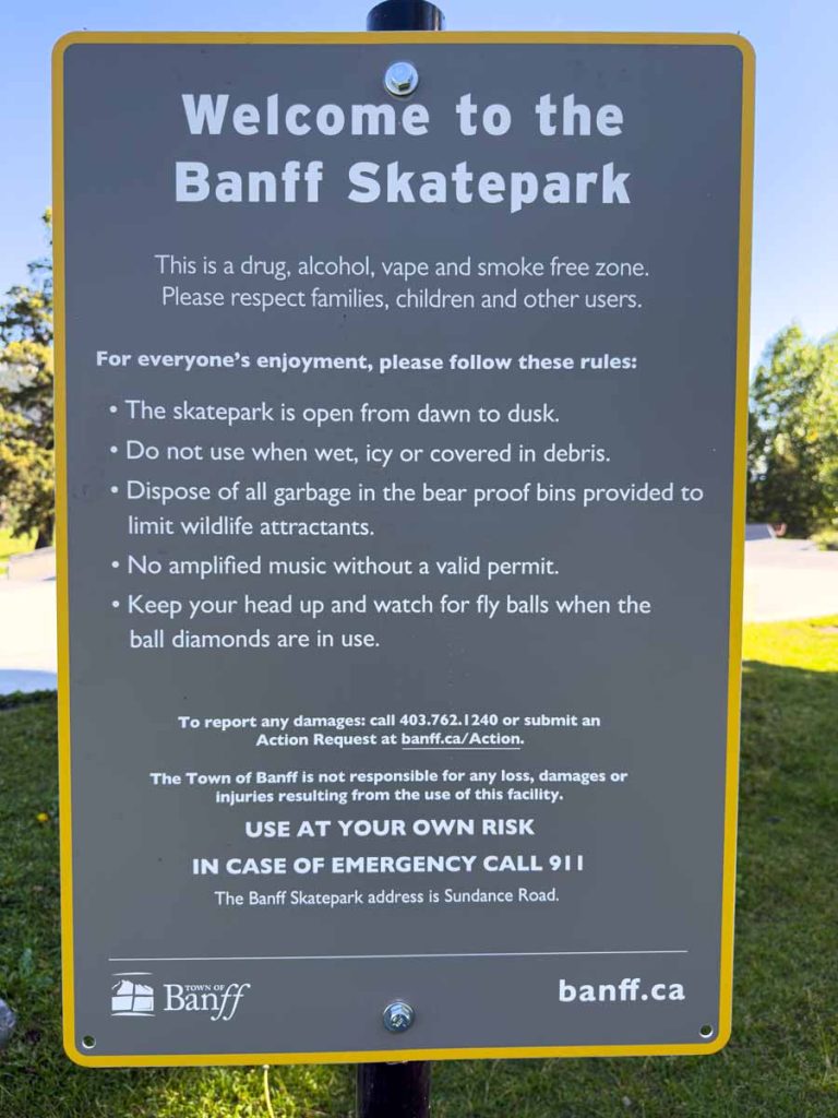 A posted sign with the rules for the Banff Skatepark.